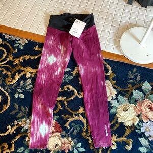 Dugout Fusion tight. NWT. Retail 100‎